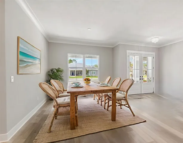 a view of an empty room with a fireplace and a window