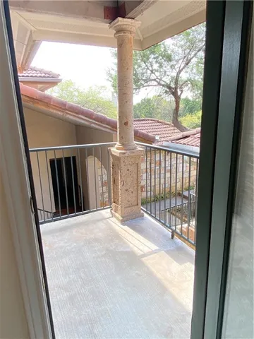 a view of balcony with porch