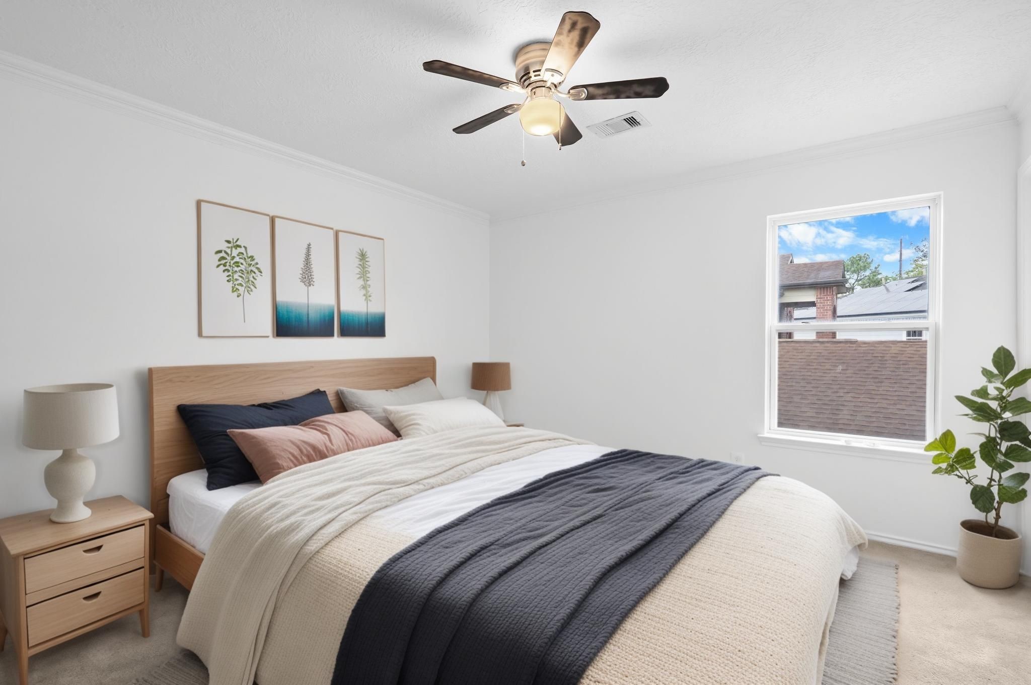 2810 Legends Knoll Drive Spring, TX 77386 - Photo 15 of 29 a bedroom with bed and a chandelier