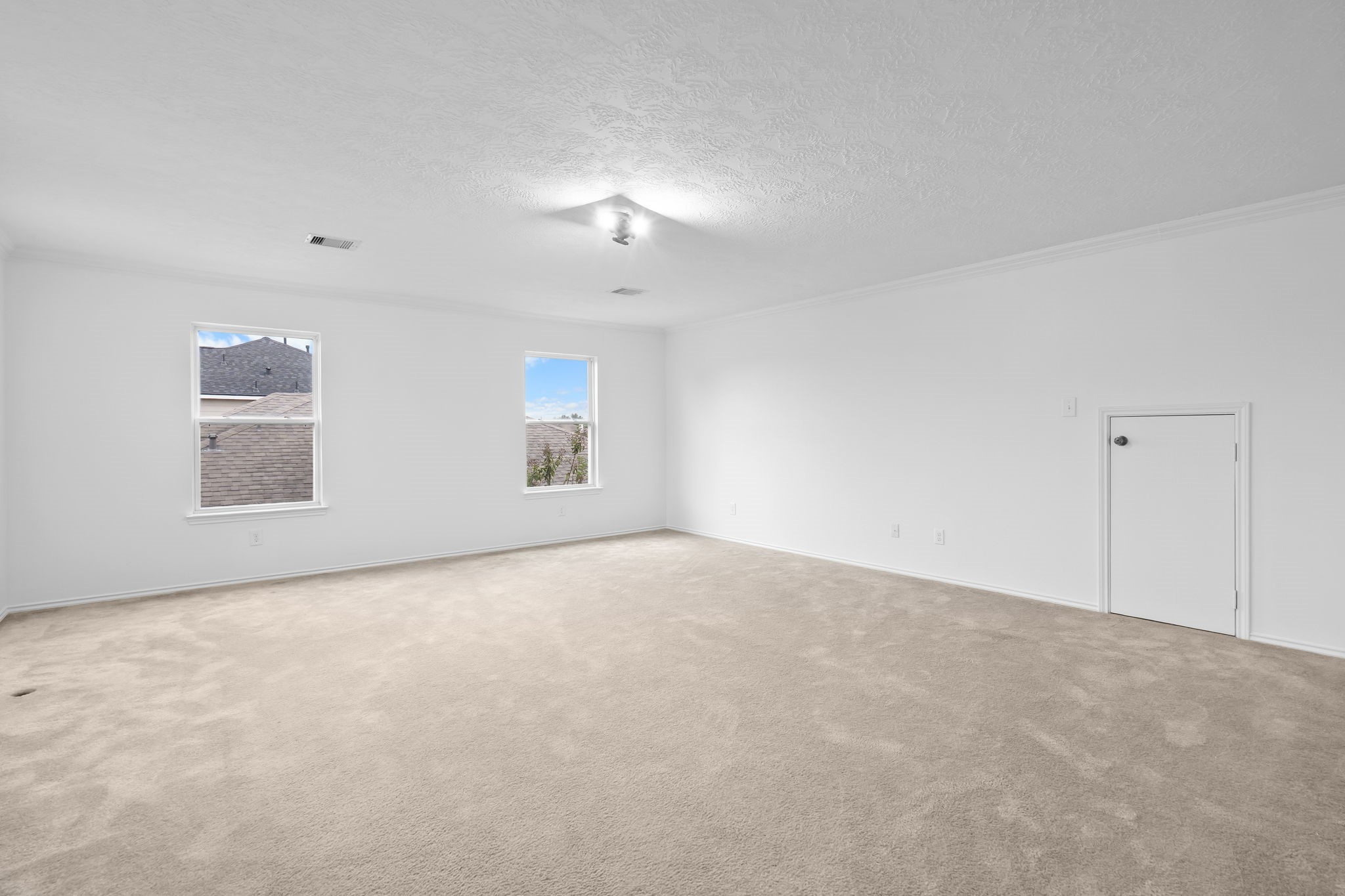2810 Legends Knoll Drive Spring, TX 77386 - Photo 17 of 29 an empty room with windows and closet