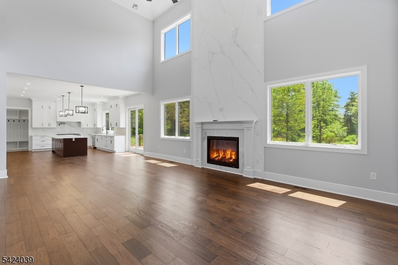 45 Kildee Road Belle Mead, NJ 08502 - Photo 5 of 43 a view of empty room with fireplace and wooden floor