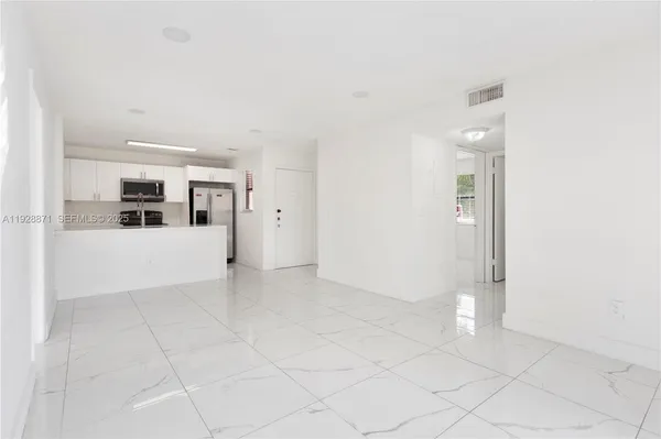a view of a livingroom with an empty space
