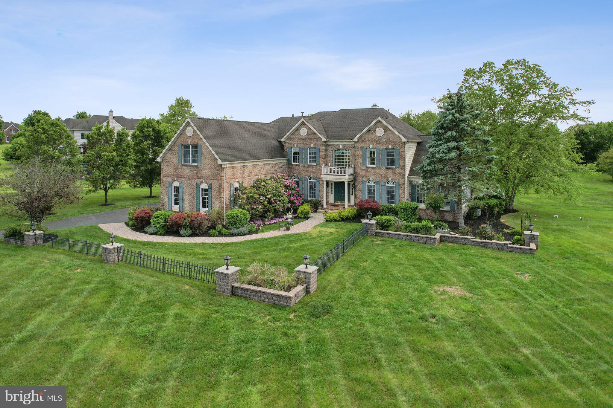 1 Baker Way Pennington, NJ 08534 - Photo 59 of 77 a front view of a house with a yard