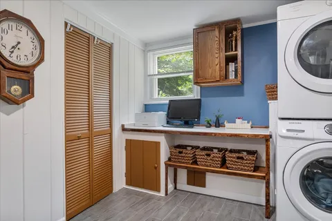 a kitchen with a stove and a refrigerator