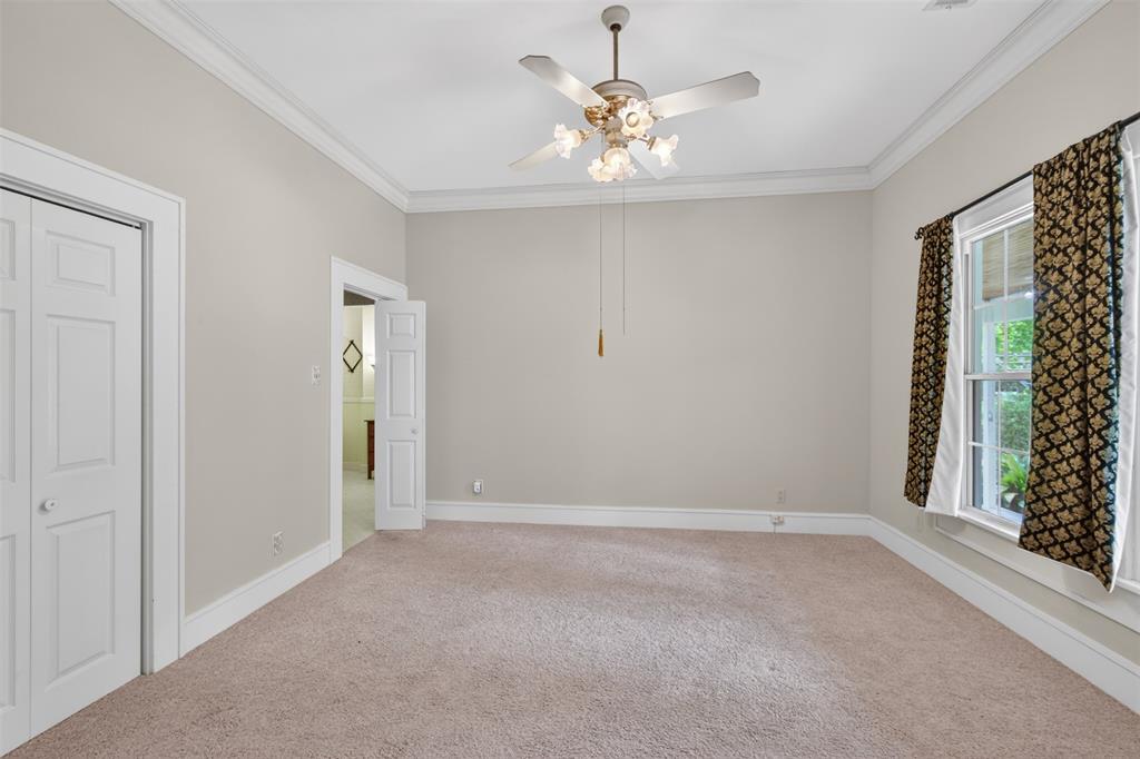 8402 Springridge-Texas Line Road Keithville, LA 71047 - Photo 13 of 40 an empty room with windows and entrance