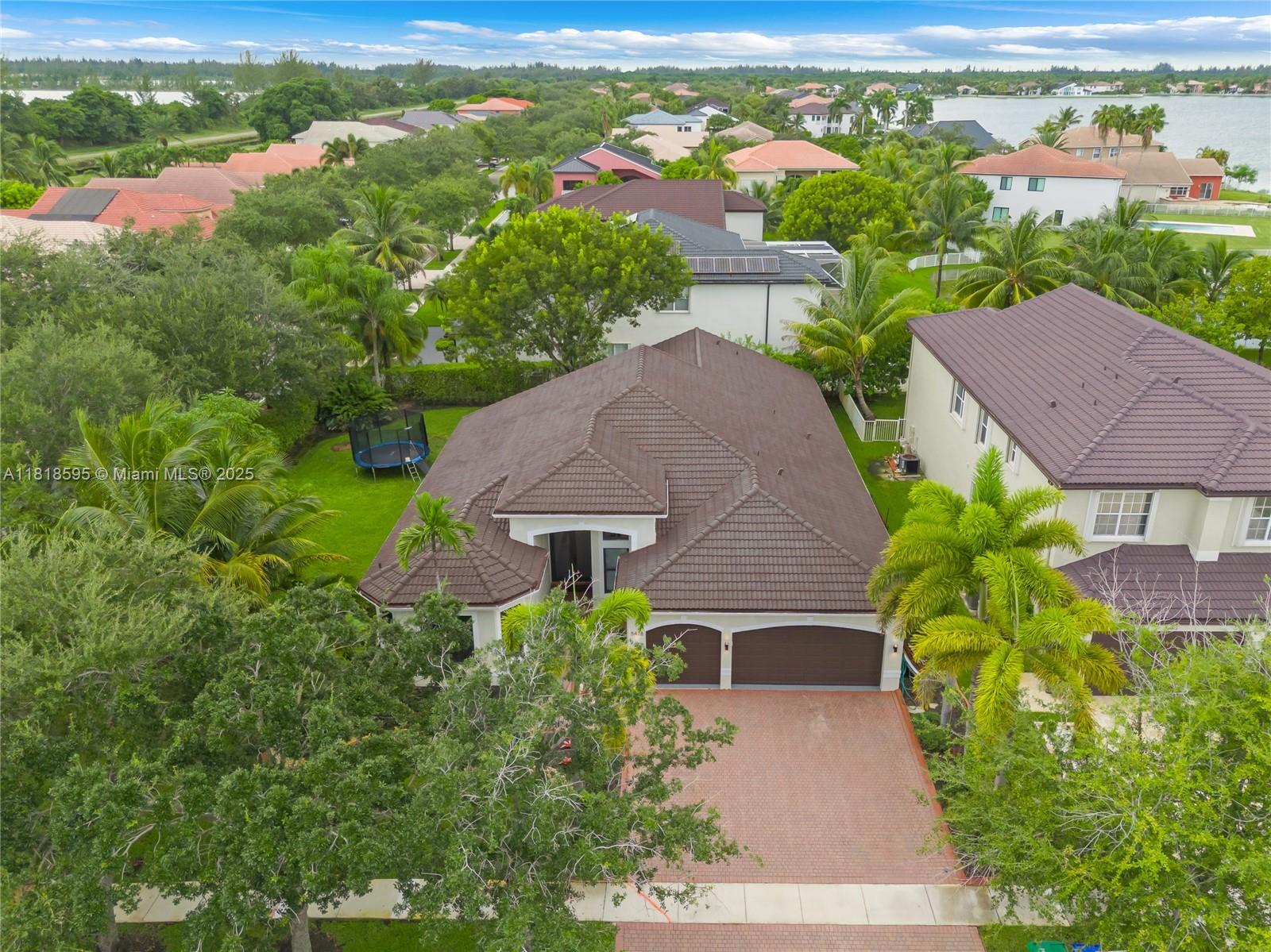 5478 Southwest 189th Avenue Miramar, FL 33029 - Photo 3 of 58 an aerial view of multiple houses with yard