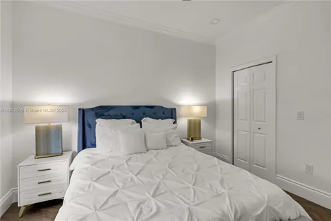 a room with a bed and a window