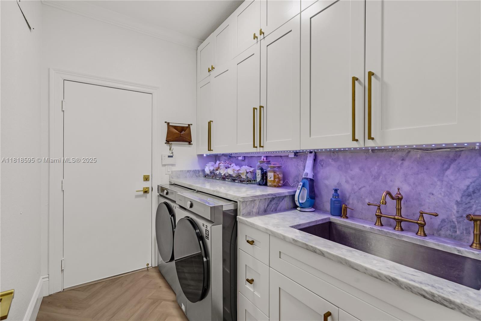 5478 Southwest 189th Avenue Miramar, FL 33029 - Photo 43 of 58 a kitchen with a sink and cabinets