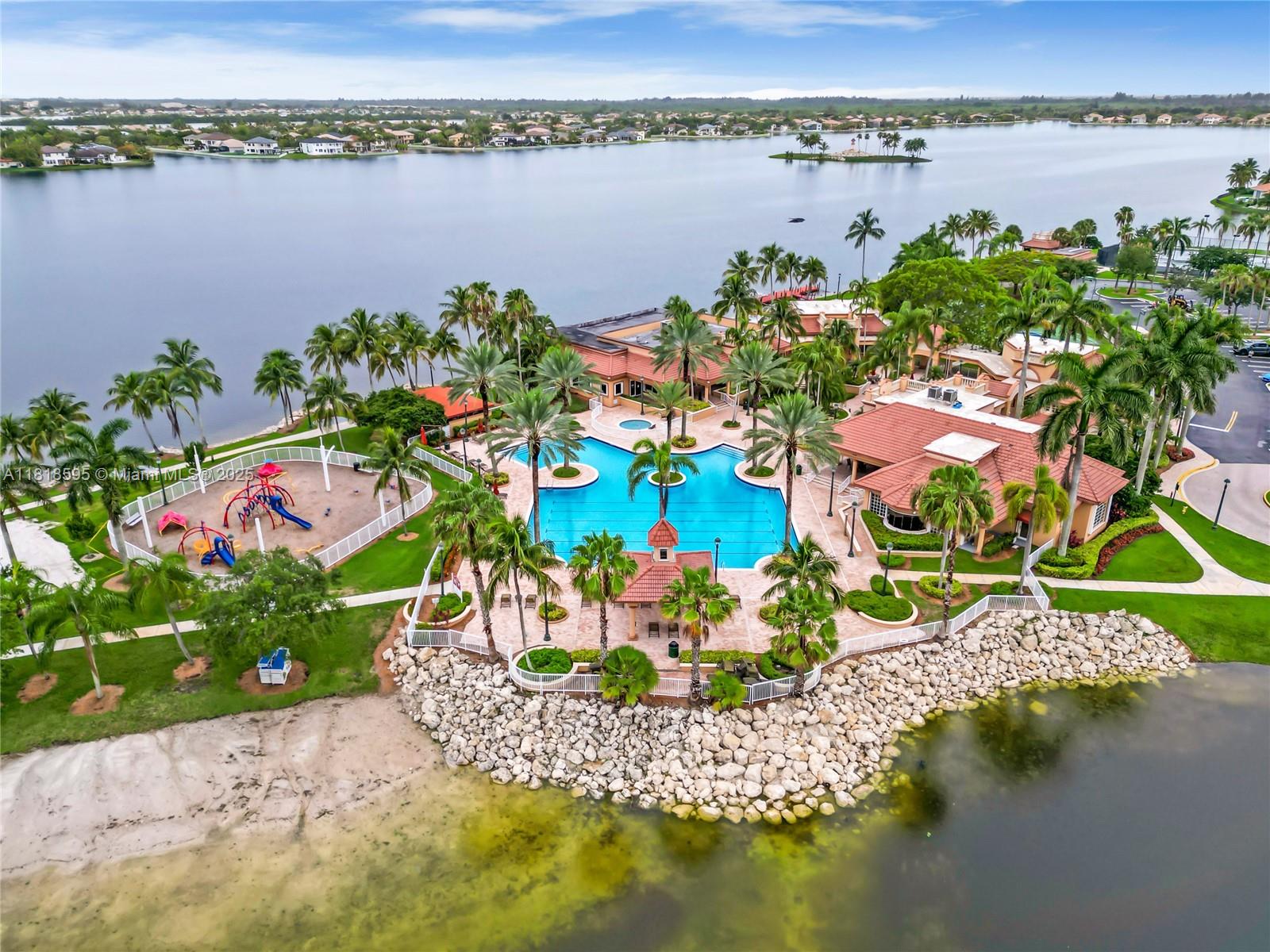 5478 Southwest 189th Avenue Miramar, FL 33029 - Photo 56 of 58 a view of a lake with a lake in the background