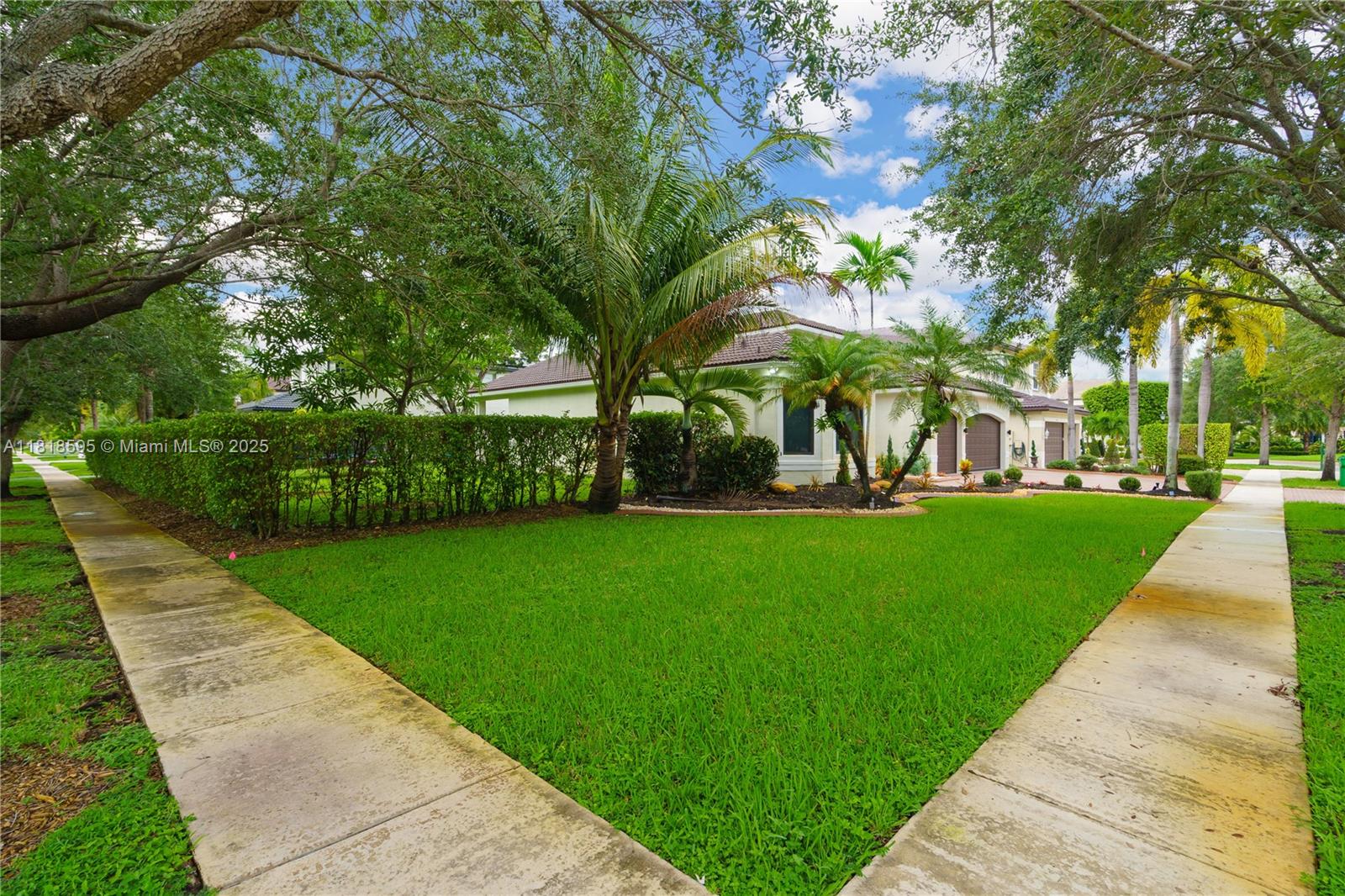 5478 Southwest 189th Avenue Miramar, FL 33029 - Photo 7 of 58 a view of a park with large trees