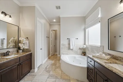 a bathroom with a shower and a sink
