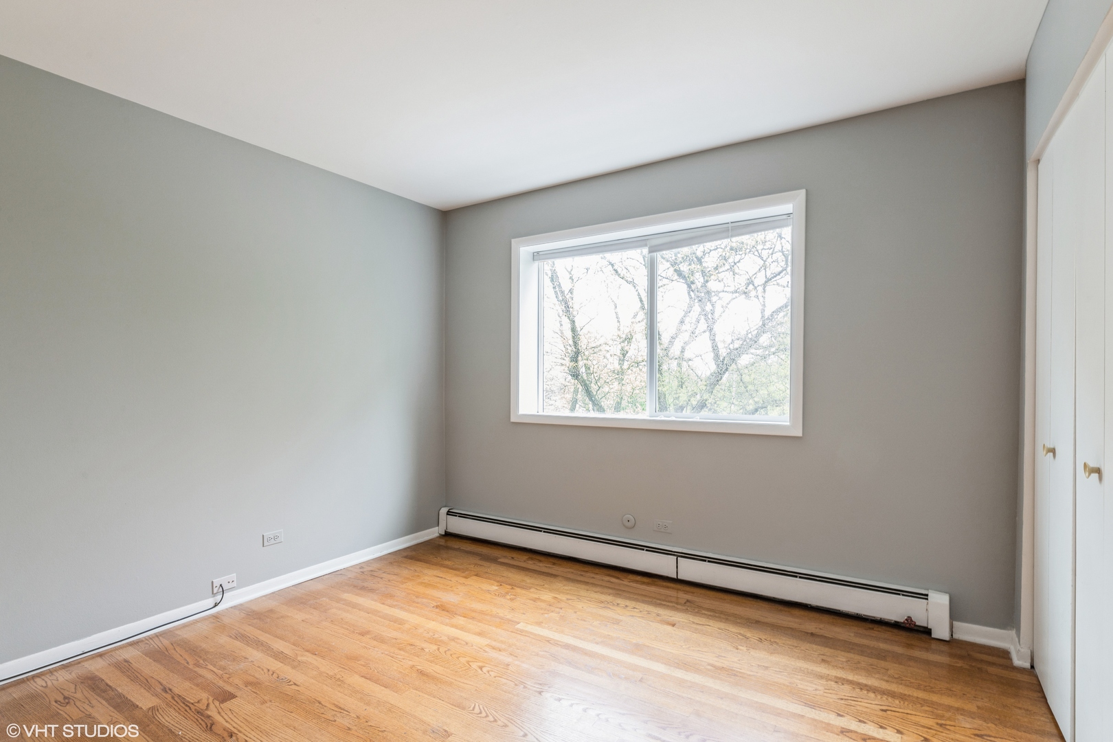 627 Ridge Road, Unit 401 Wilmette, IL 60091 - Photo 9 of 12 a view of empty room with window