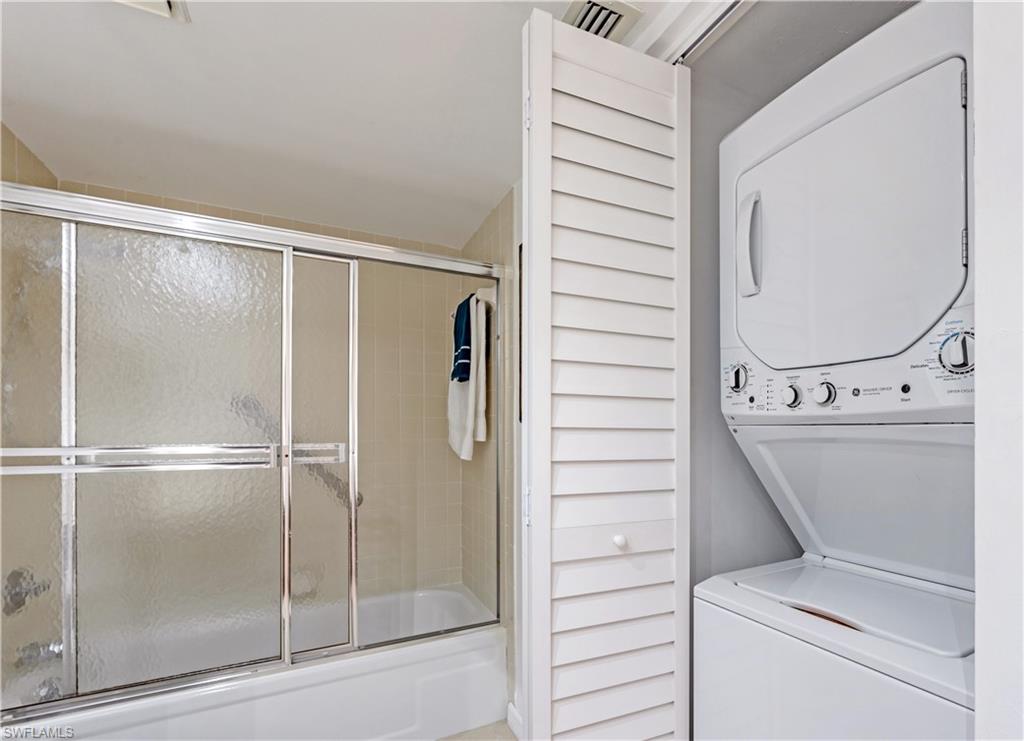 415 Augusta Boulevard, Unit 307 Naples, FL 34113 - Photo 26 of 36 a bathroom with a shower