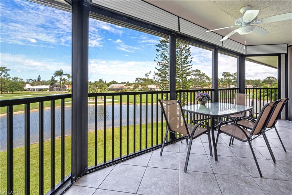 415 Augusta Boulevard, Unit 307 Naples, FL 34113 - Photo 29 of 36 a view of a two chairs in the balcony