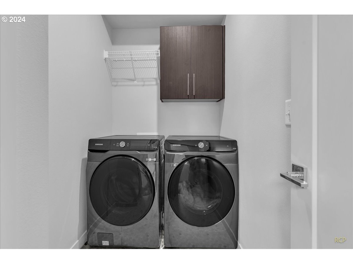 14465 Southwest Aiken Lane Beaverton, OR 97005 - Photo 23 of 30 a utility room with dryer and washer