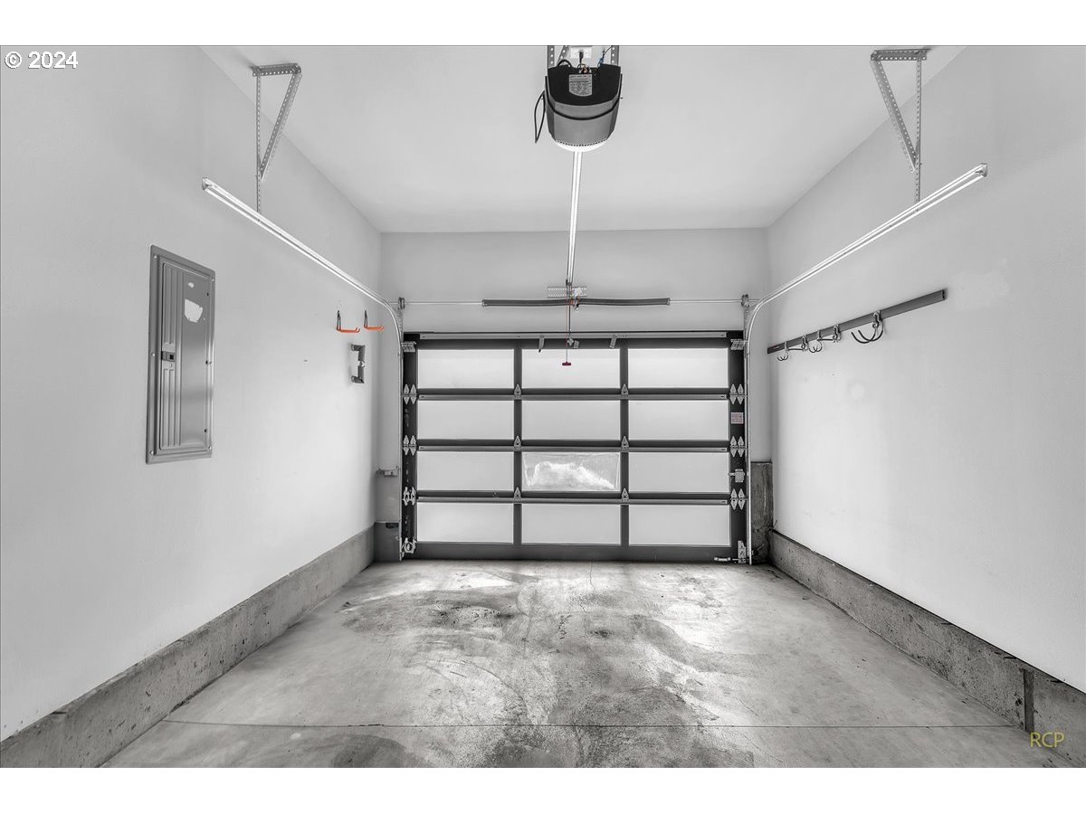 14465 Southwest Aiken Lane Beaverton, OR 97005 - Photo 26 of 30 a view of a garage