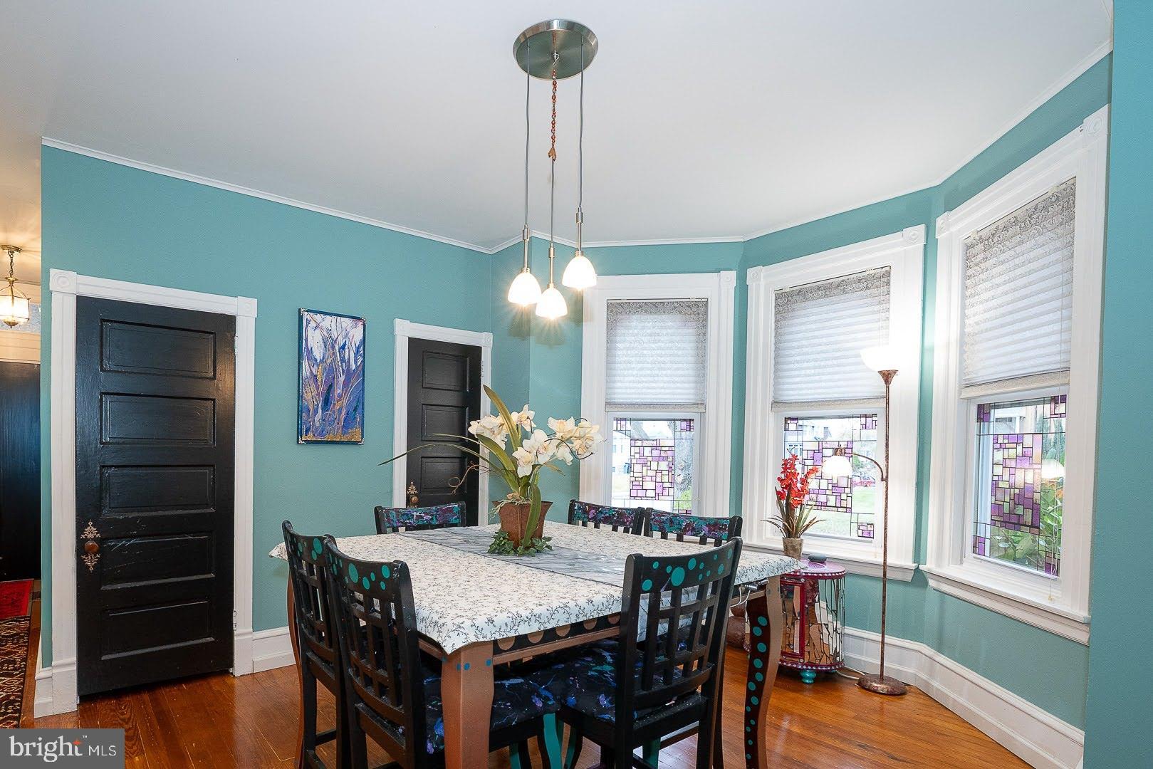 507 Morton Avenue Ridley Park, PA 19078 - Photo 14 of 42 a view of a dining room with furniture window and wooden floor