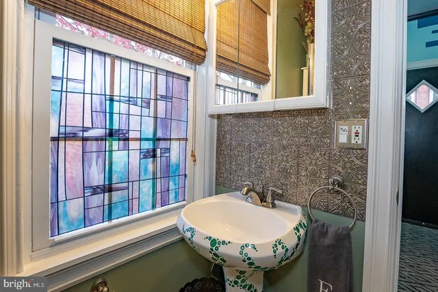 a bathroom with a sink and toilet