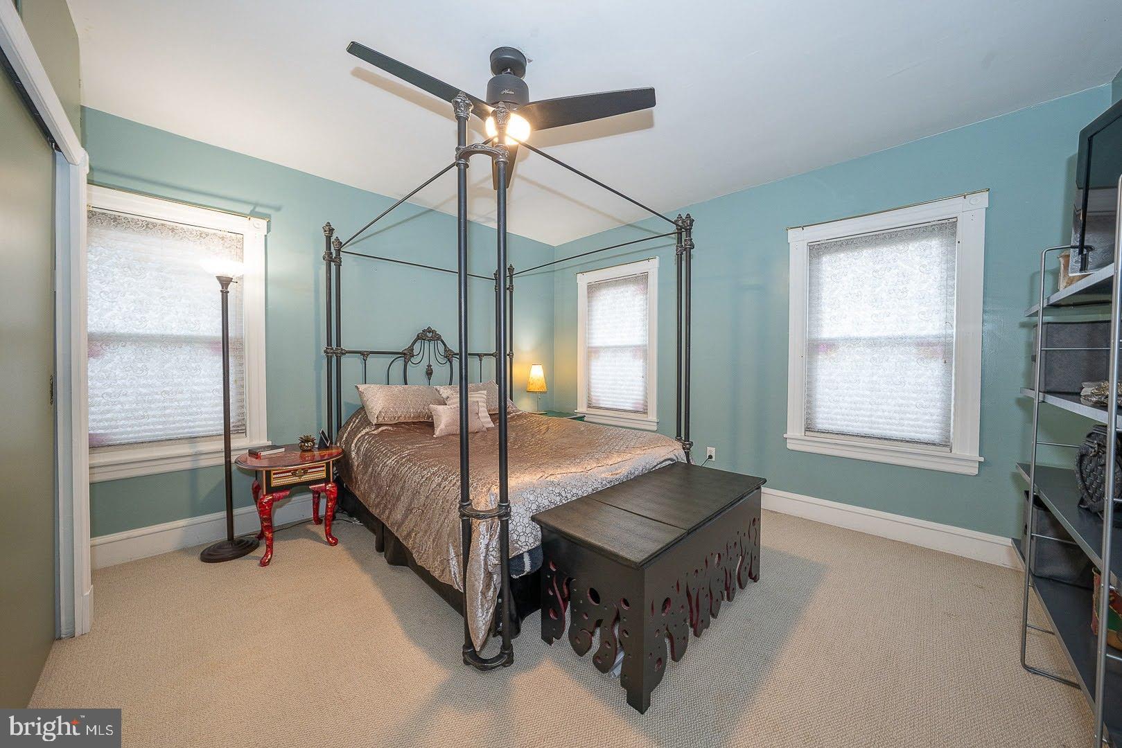 507 Morton Avenue Ridley Park, PA 19078 - Photo 23 of 42 a bedroom with a bed table and chair