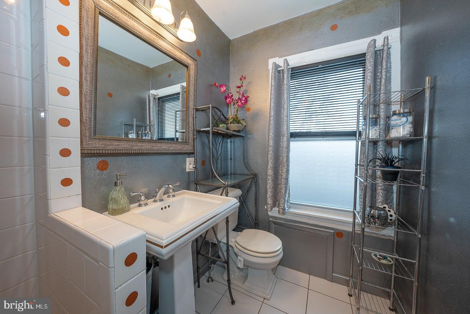 507 Morton Avenue Ridley Park, PA 19078 - Photo 30 of 42 a bathroom with a sink toilet and shower