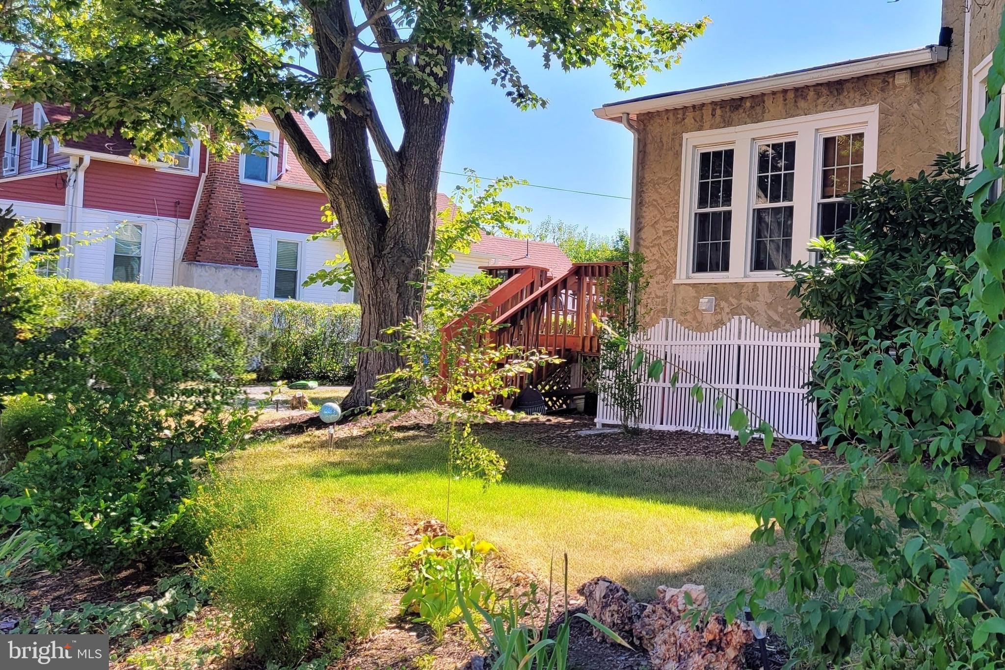 507 Morton Avenue Ridley Park, PA 19078 - Photo 41 of 42 front view of a house with swimming pool and a yard