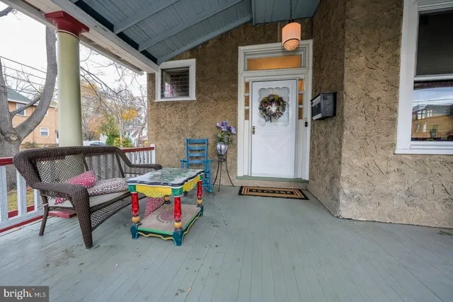 a living room with furniture and windows