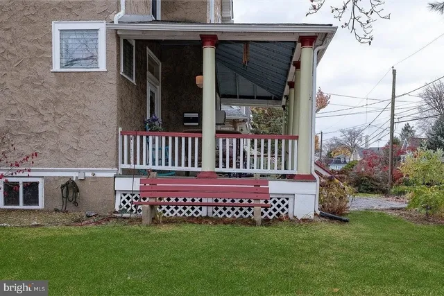 a view of a deck with a yard