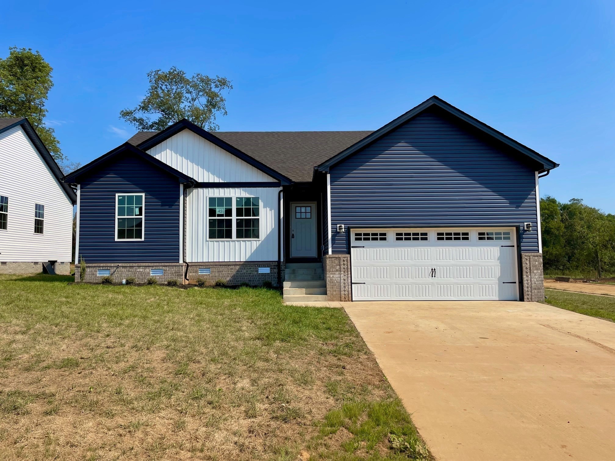 13 Echo Ridge Oak Grove, KY 42262 - Photo 1 of 24 a view of a house with a yard and garage