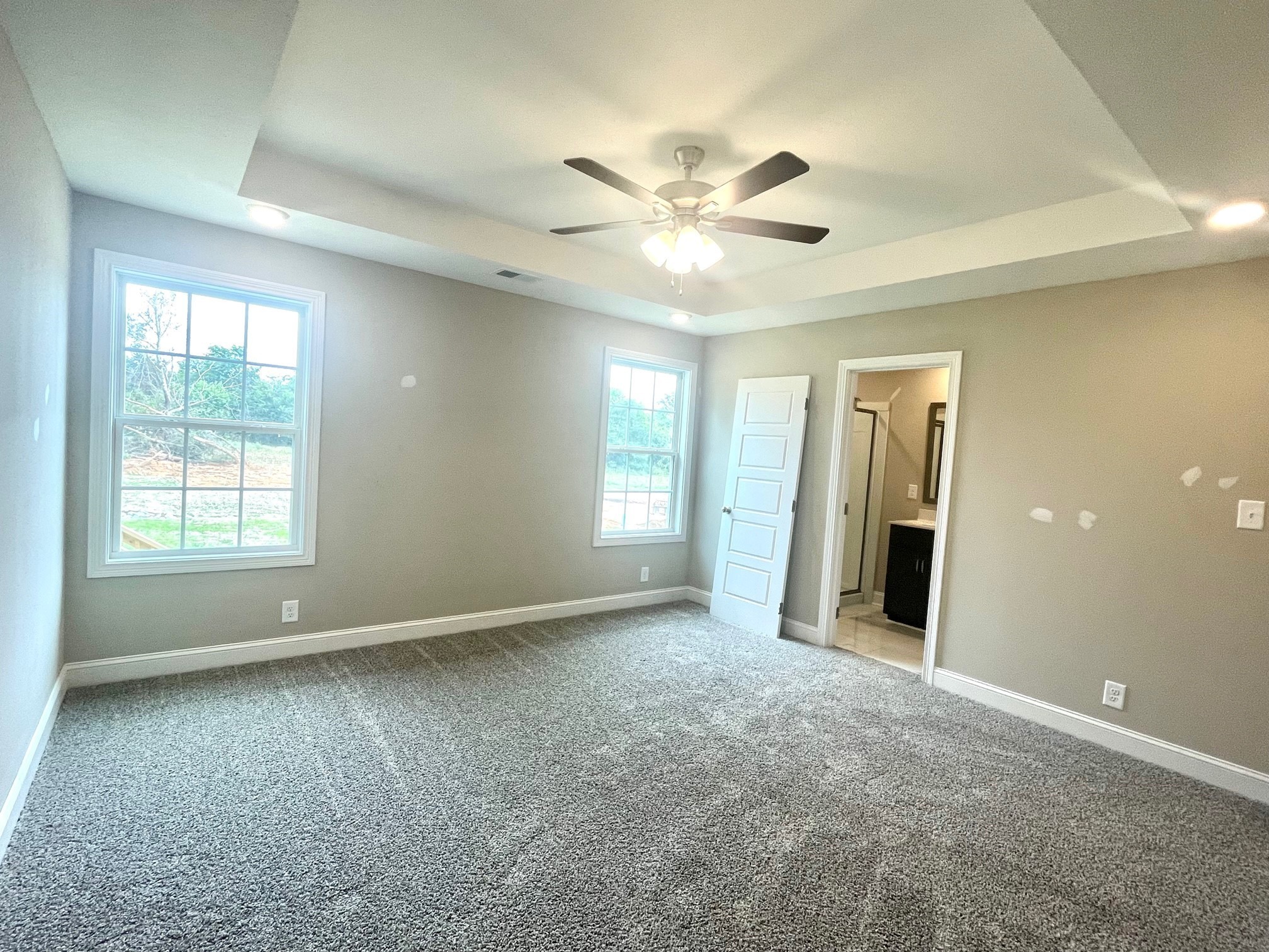 13 Echo Ridge Oak Grove, KY 42262 - Photo 12 of 24 a view of an empty room with chandelier fan and a window