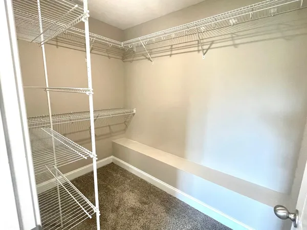a bathroom with a shower and a shower