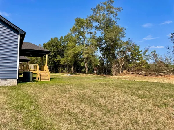 a view of a house with swimming pool
