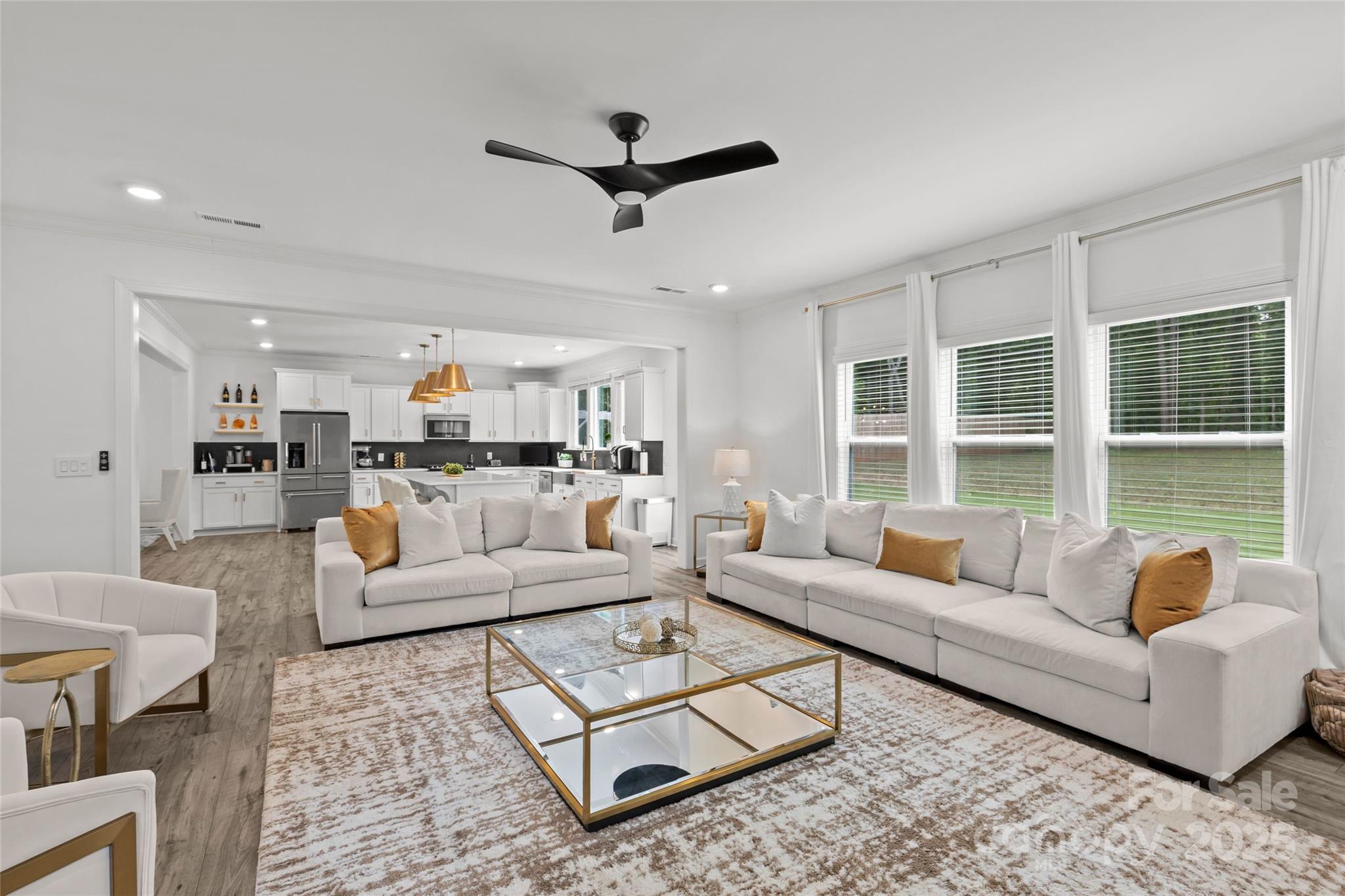 5902 Beatties Ford Road Charlotte, NC 28216 - Photo 20 of 48 a living room with furniture and a large window