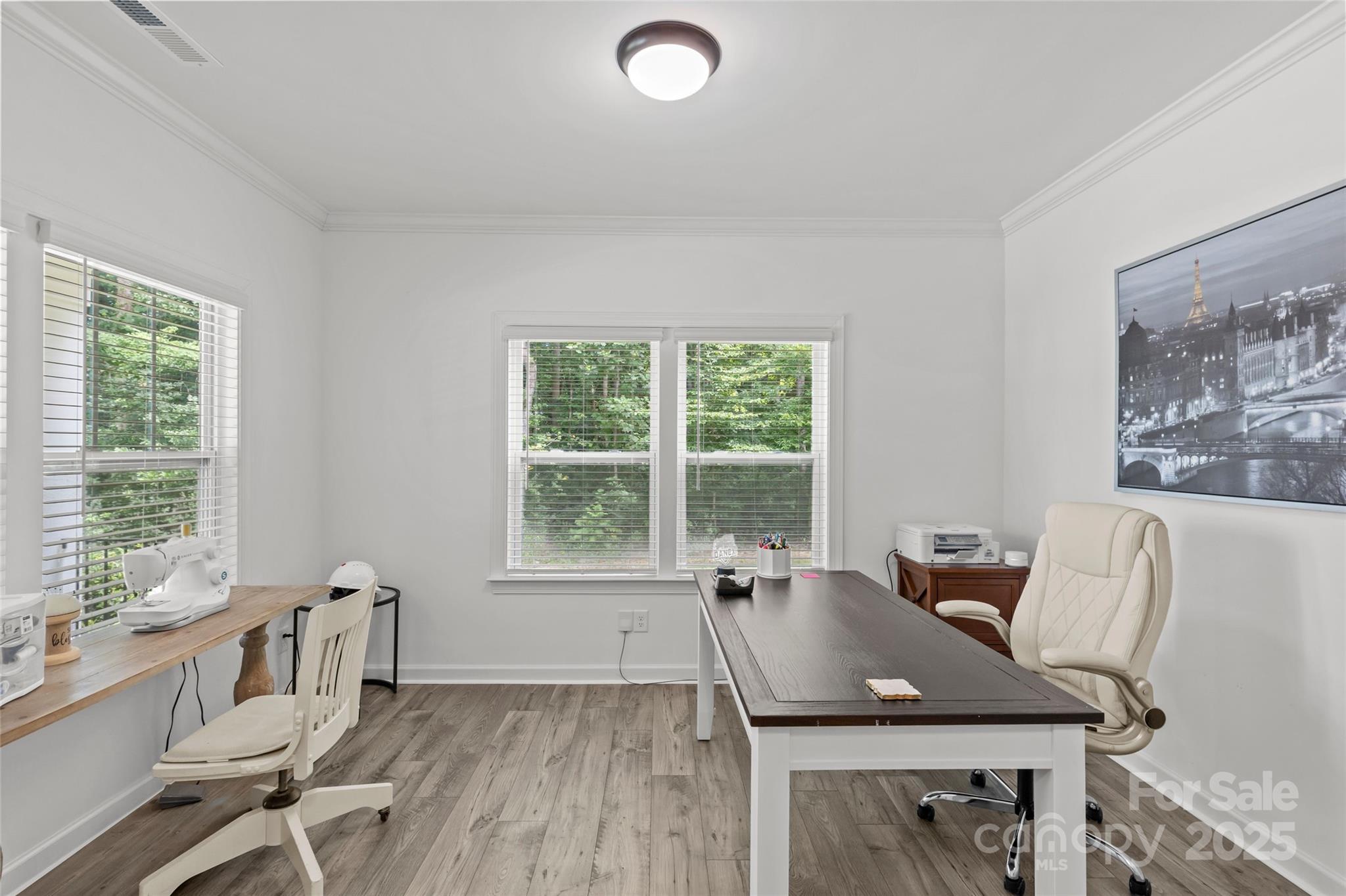 5902 Beatties Ford Road Charlotte, NC 28216 - Photo 22 of 48 a workspace with furniture and a window