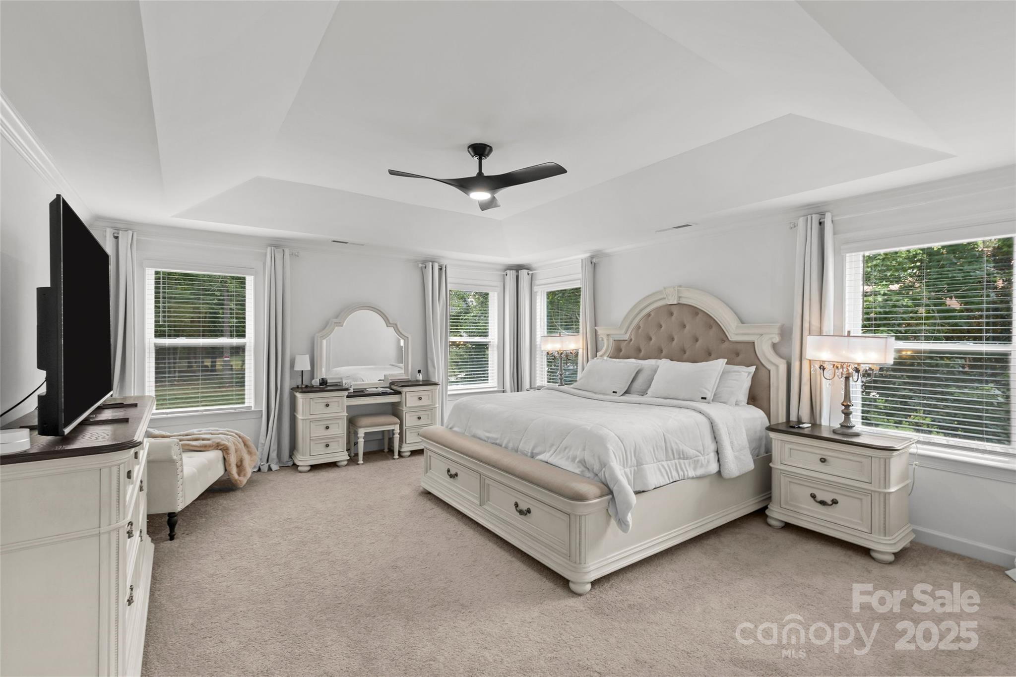 5902 Beatties Ford Road Charlotte, NC 28216 - Photo 24 of 48 a bedroom with bed tv and window