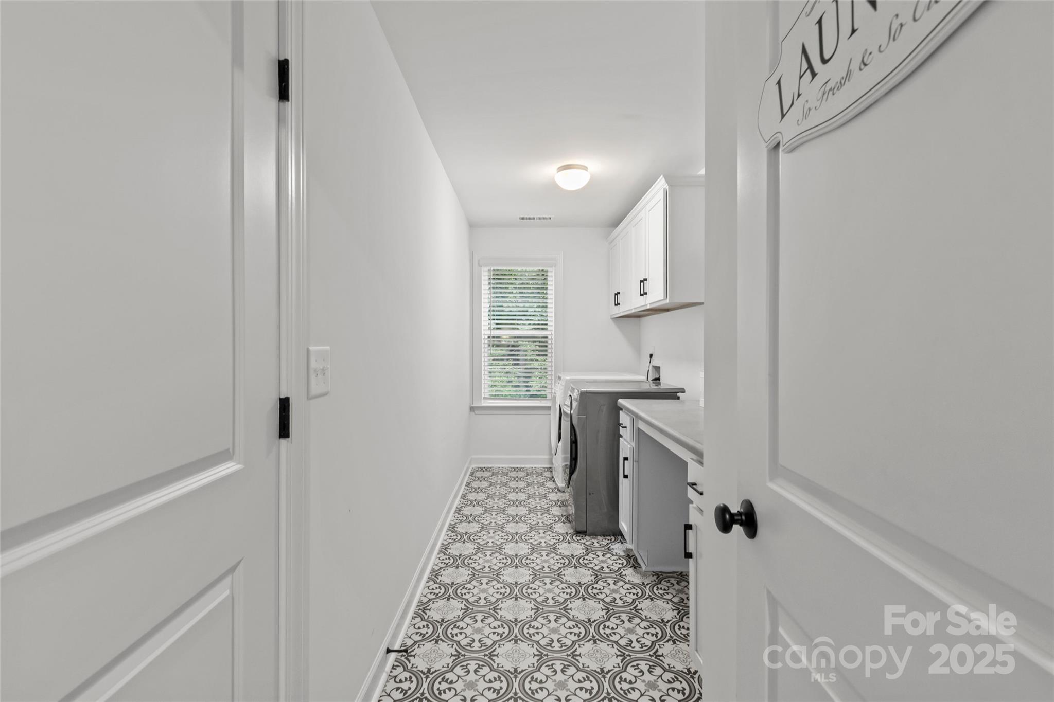 5902 Beatties Ford Road Charlotte, NC 28216 - Photo 34 of 48 a bathroom with a sink a toilet and a shower