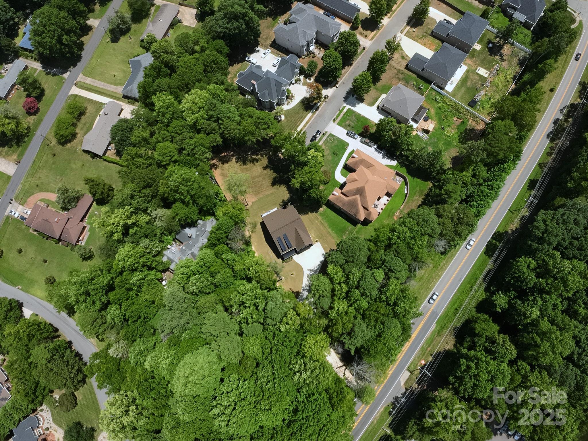 5902 Beatties Ford Road Charlotte, NC 28216 - Photo 47 of 48 an aerial view of residential house with outdoor space and street view