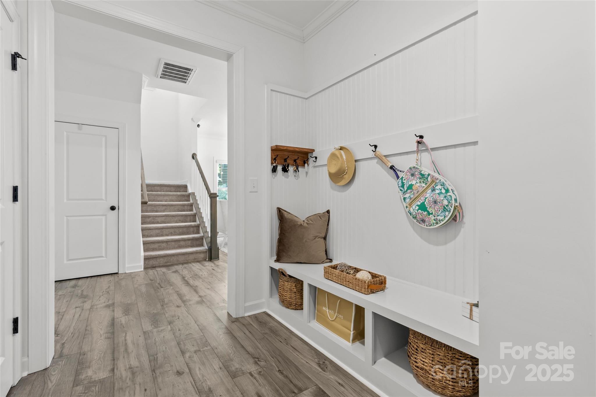 5902 Beatties Ford Road Charlotte, NC 28216 - Photo 6 of 48 a living room with a bed and a couch