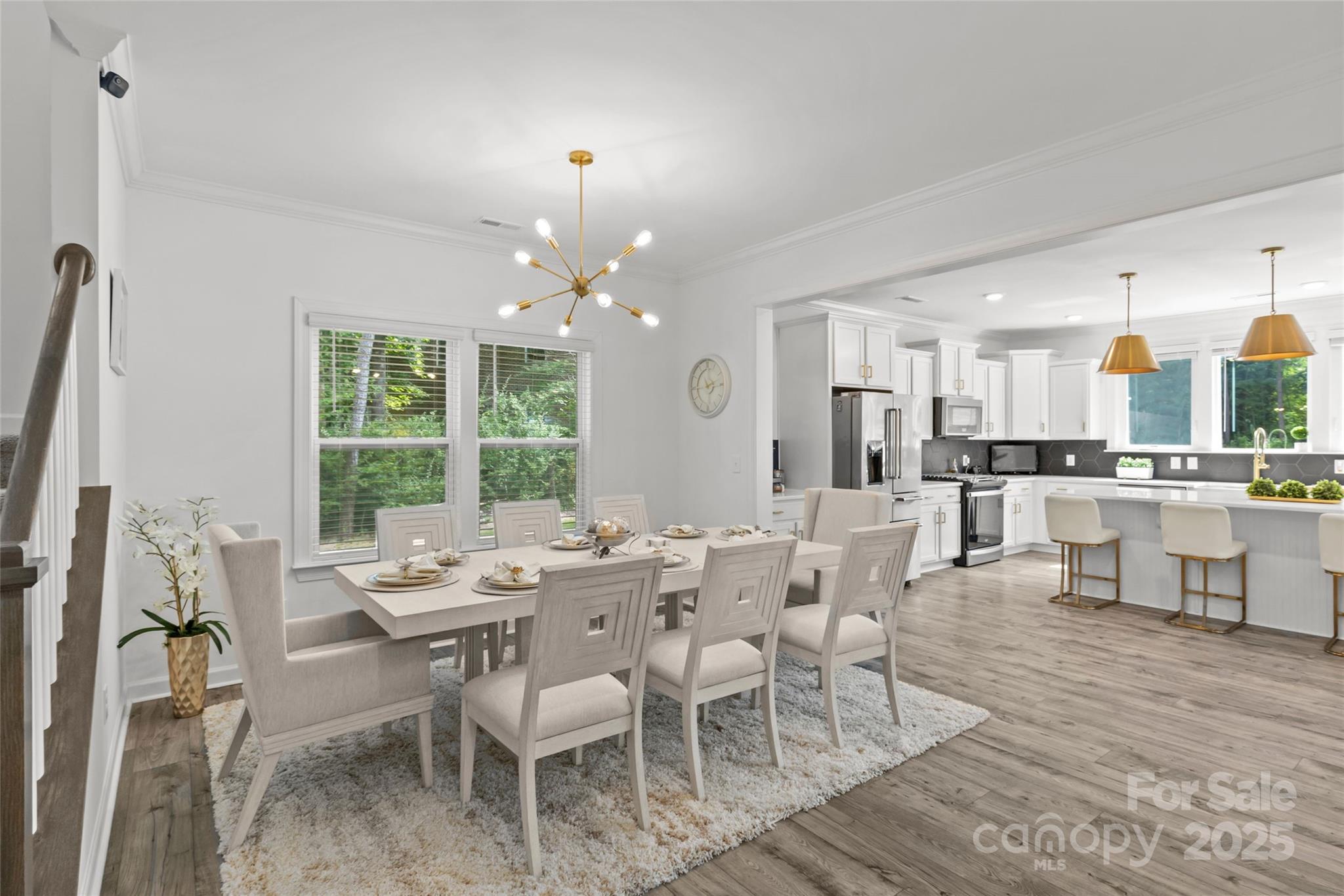 5902 Beatties Ford Road Charlotte, NC 28216 - Photo 7 of 48 a view of a dining room with furniture and wooden floor