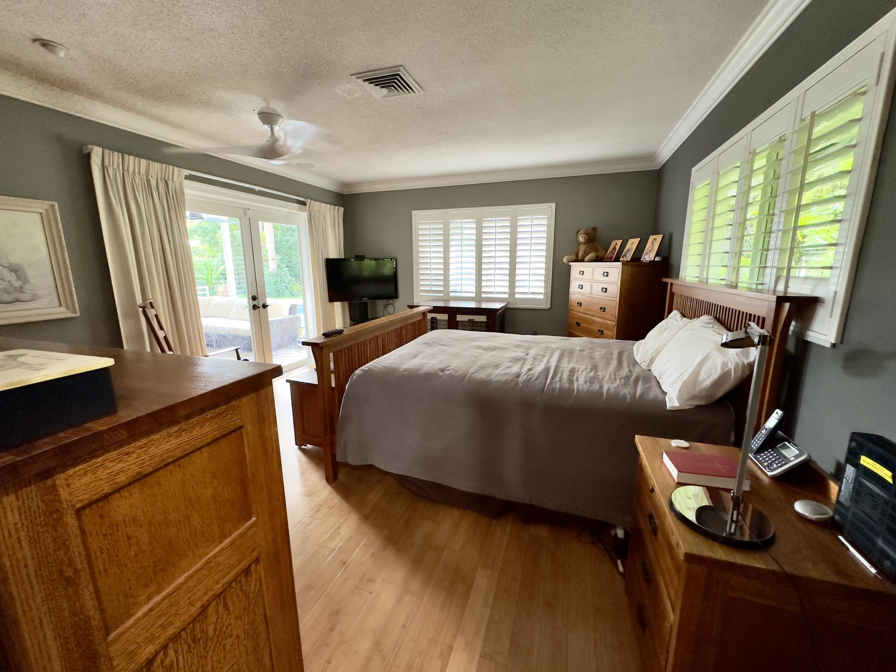 1111 Tamarind Way Boca Raton, FL 33486 - Photo 13 of 25 Primary bedroom