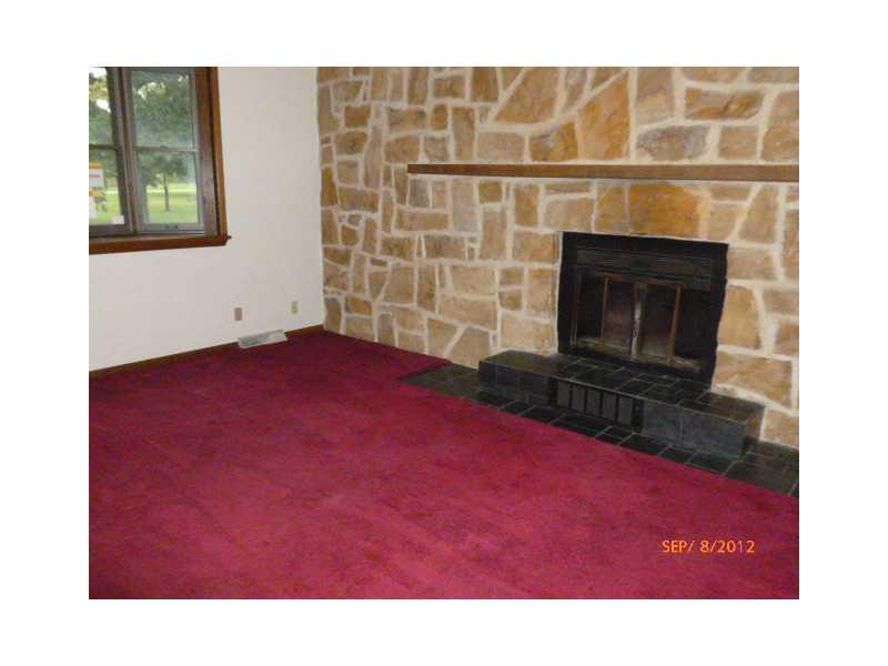 4997 County Line Road New Castle, PA 16101 - Photo 3 of 4 Other. fireplace in living room