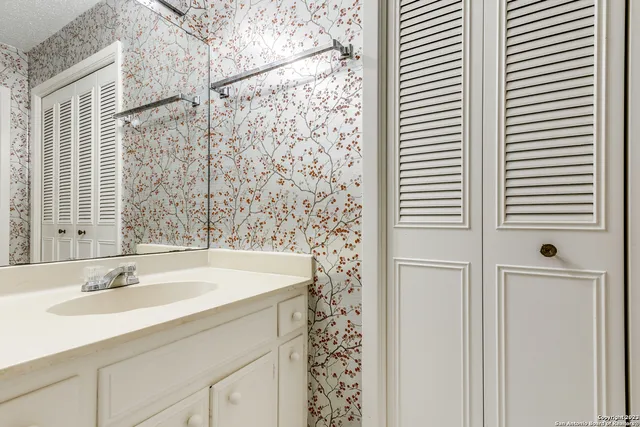 a bathroom with a sink and a bathtub