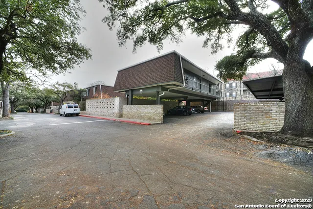 a car parked in front of a house