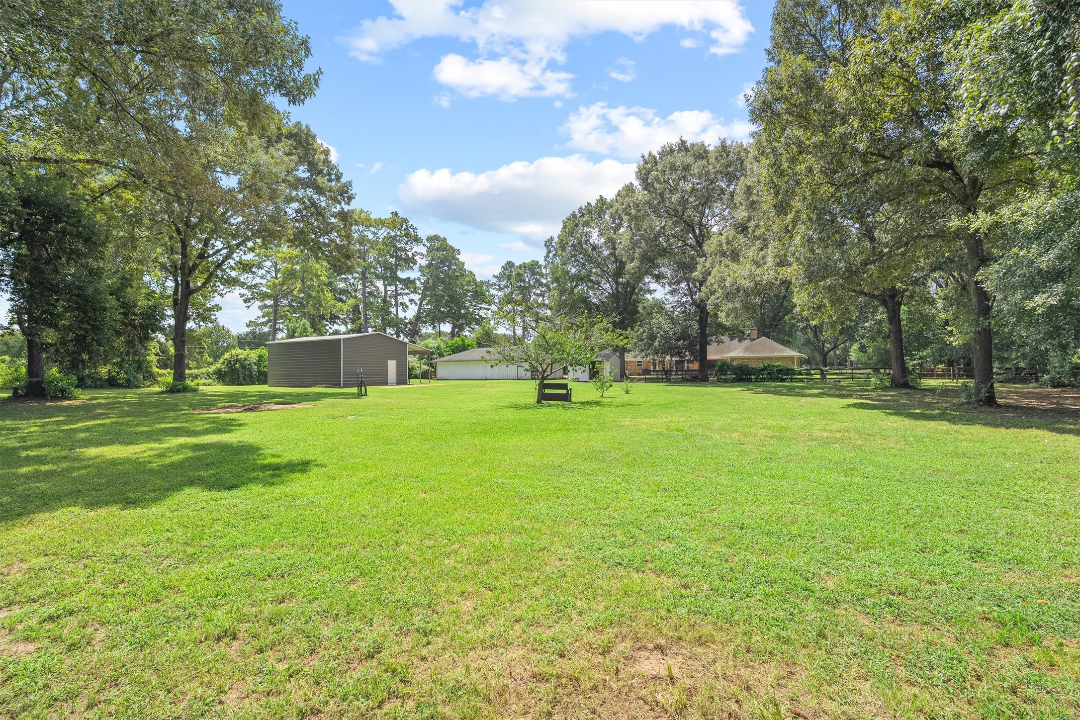16008 Lutheran School Road Tomball, TX 77377 - Photo 43 of 50 Beautiful view from the back of the property looking back towards the home.