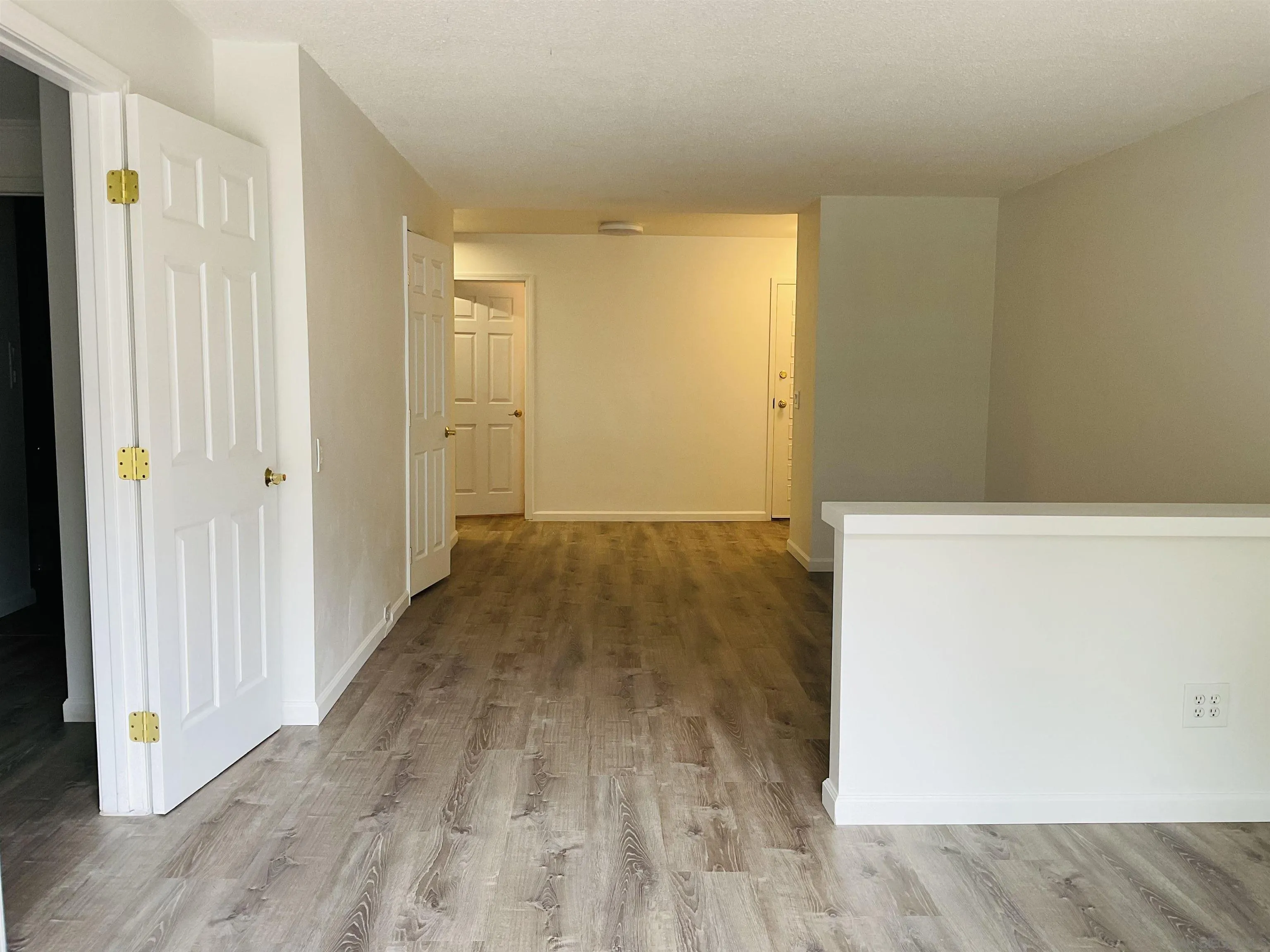 2600 Torrey Pines Road, Unit A25 La Jolla, CA 92037 - Photo 16 of 47 a view of a room with wooden floor