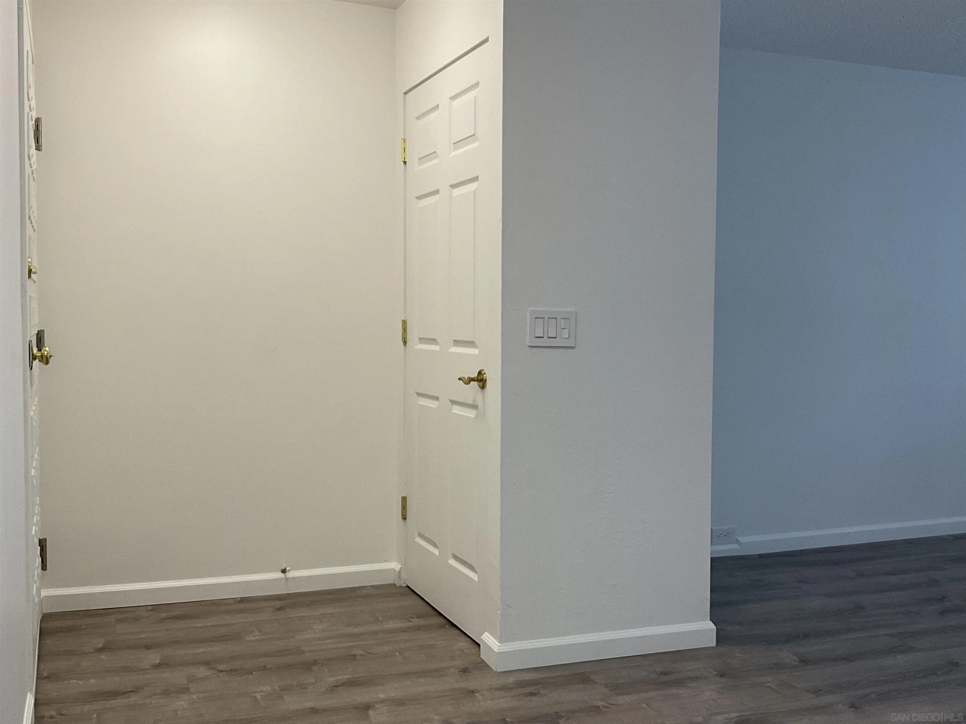 2600 Torrey Pines Road, Unit A25 La Jolla, CA 92037 - Photo 27 of 47 an empty room with wooden floor