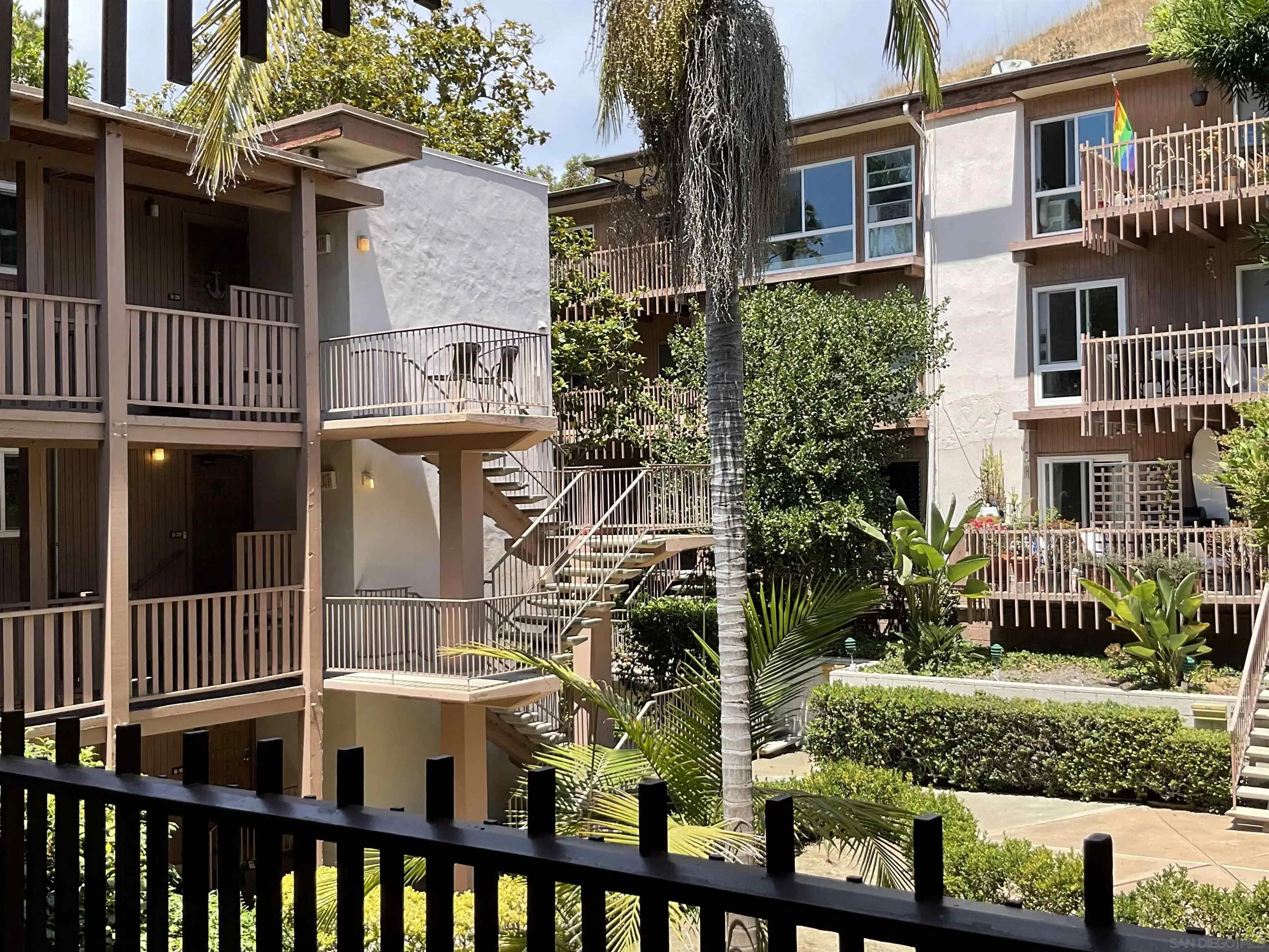 2600 Torrey Pines Road, Unit A25 La Jolla, CA 92037 - Photo 42 of 47 a front view of a house with a yard