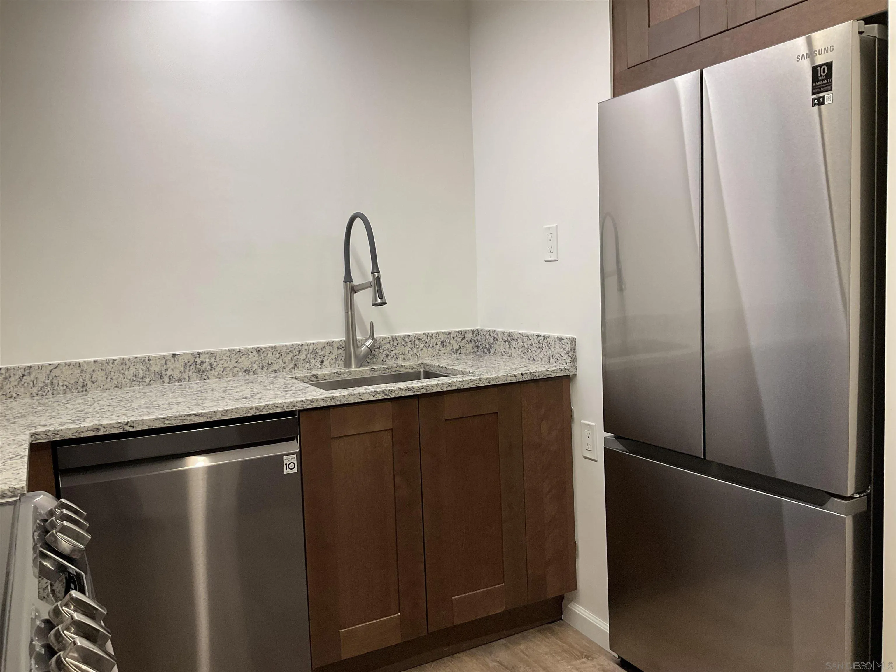 2600 Torrey Pines Road, Unit A25 La Jolla, CA 92037 - Photo 6 of 47 a close view of a refrigerator and dishwasher