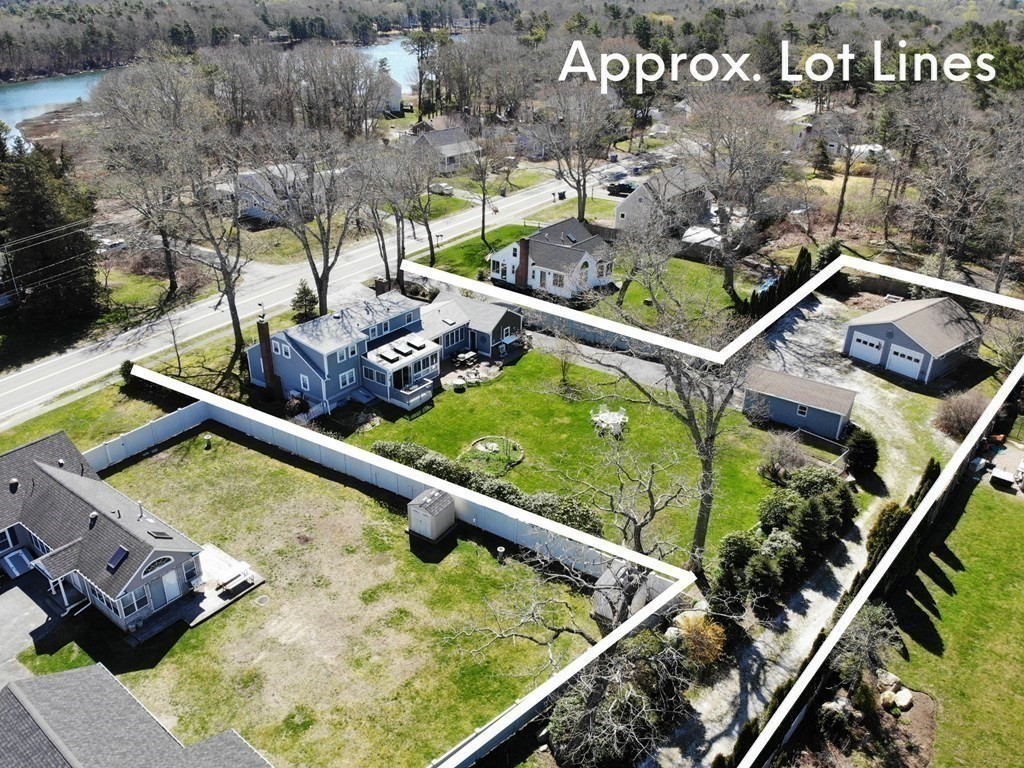 316 Shore Road Bourne, MA 02532 - Photo 2 of 39 a view of swimming pool from a balcony