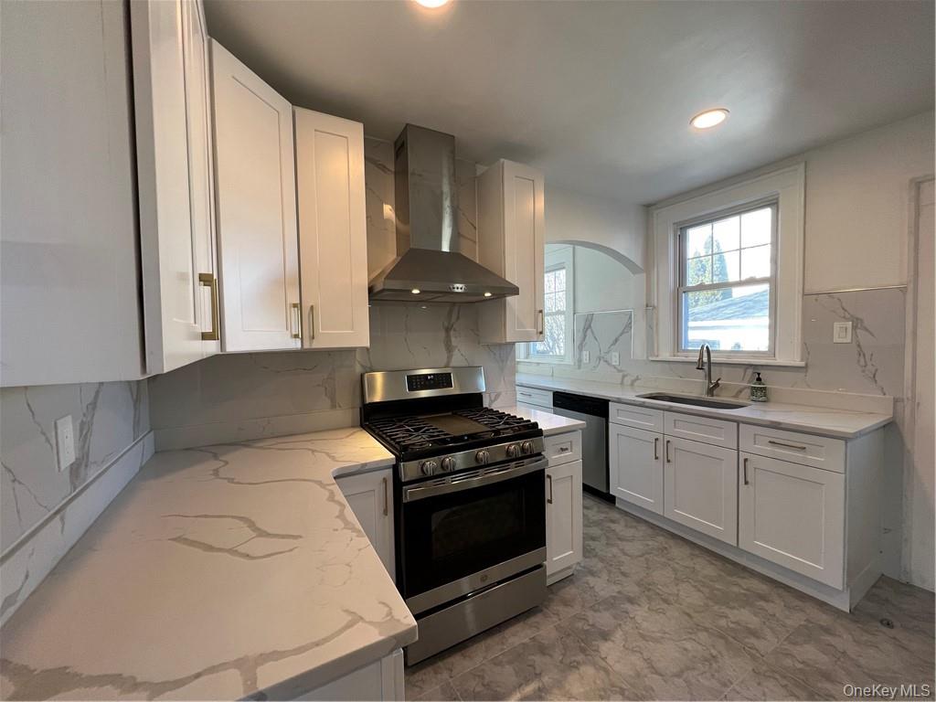 85 Locust Avenue Scarsdale, NY 10583 - Photo 17 of 38 a kitchen with granite countertop a stove and a sink