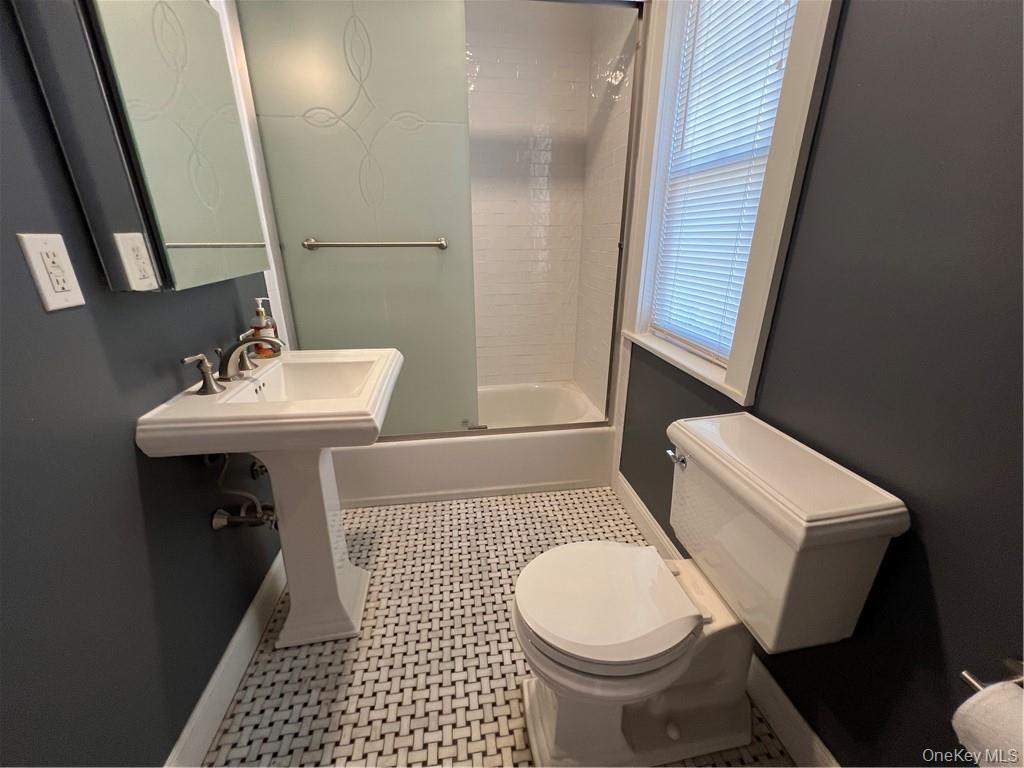 85 Locust Avenue Scarsdale, NY 10583 - Photo 18 of 38 a bathroom with a sink toilet and shower